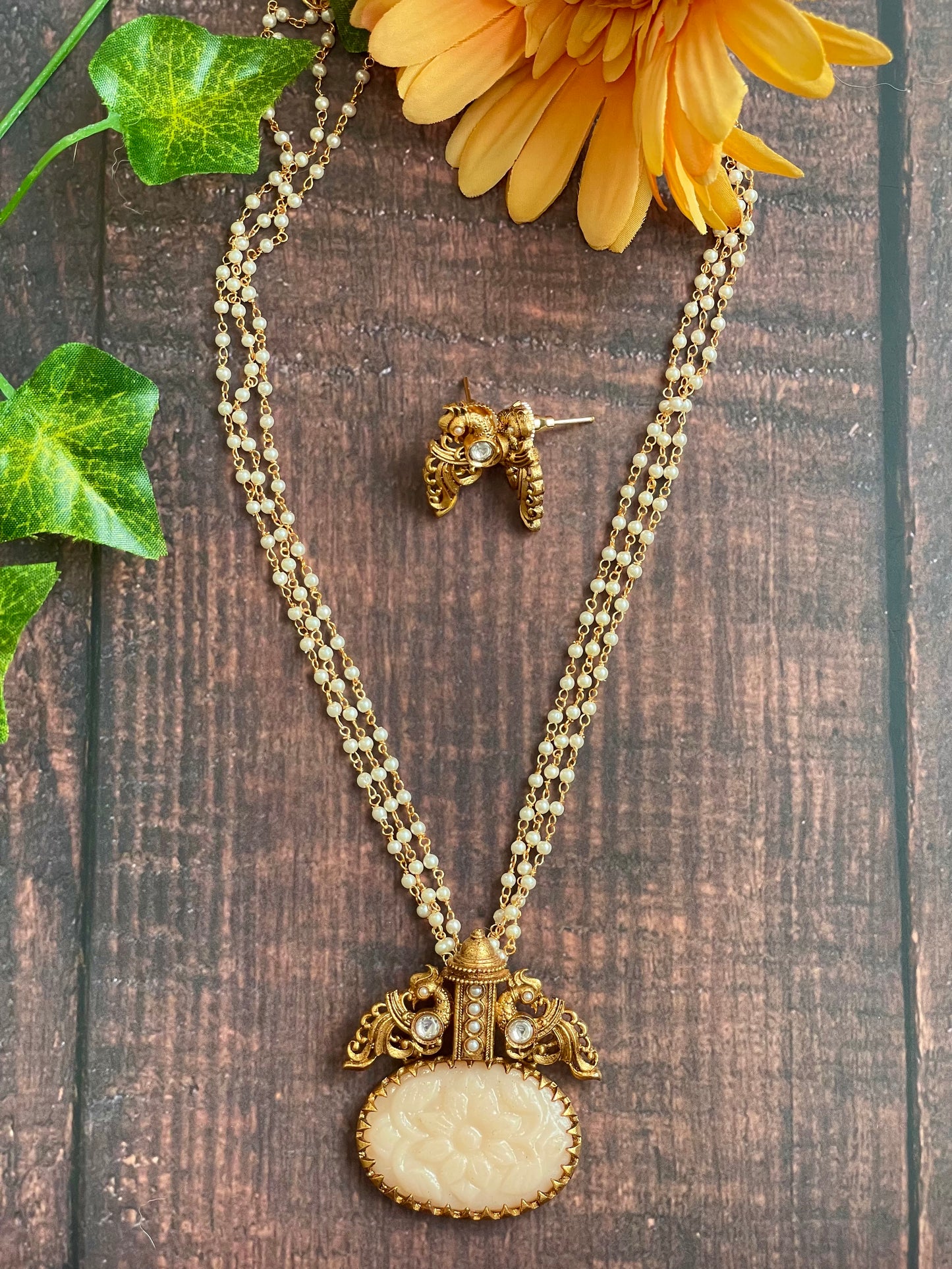 Carved Stone Pendant Necklace